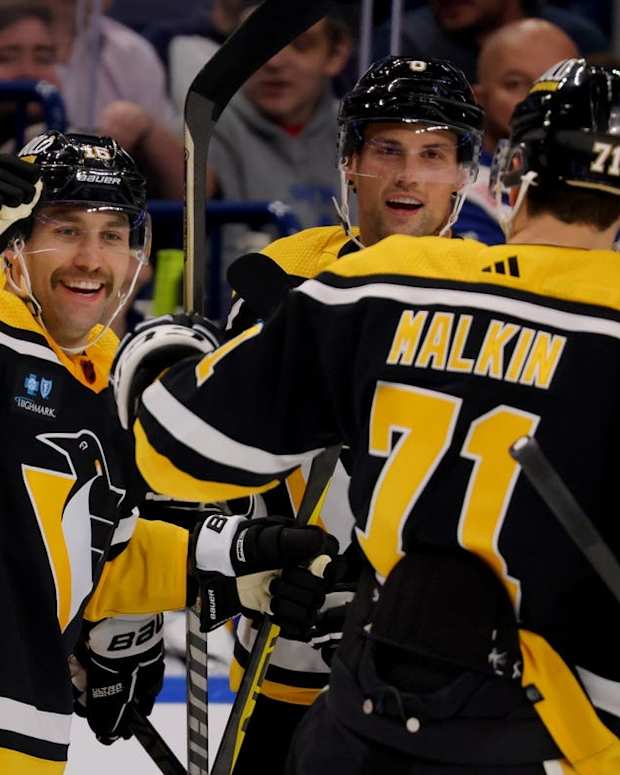 Nov 2, 2022; Buffalo, New York, USA; Pittsburgh Penguins left wing Jason Zucker (16) celebrates his goal with center Evgeni Malkin (71) during the first period against the Buffalo Sabres at KeyBank Center. Mandatory Credit: Timothy T. Ludwig-USA TODAY Sports